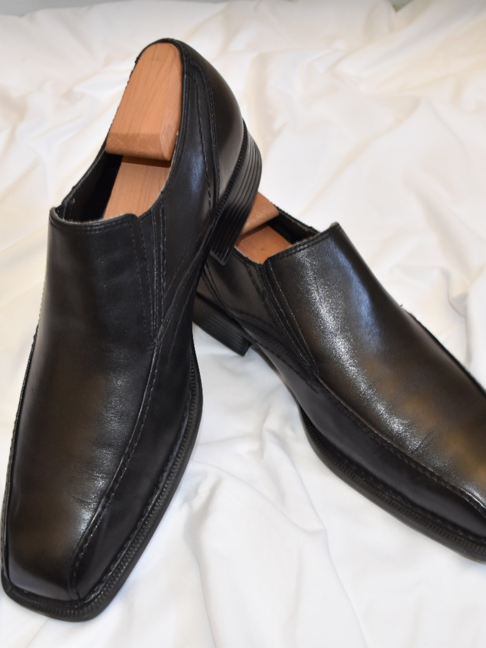 Slip on all leather black dress shoes.